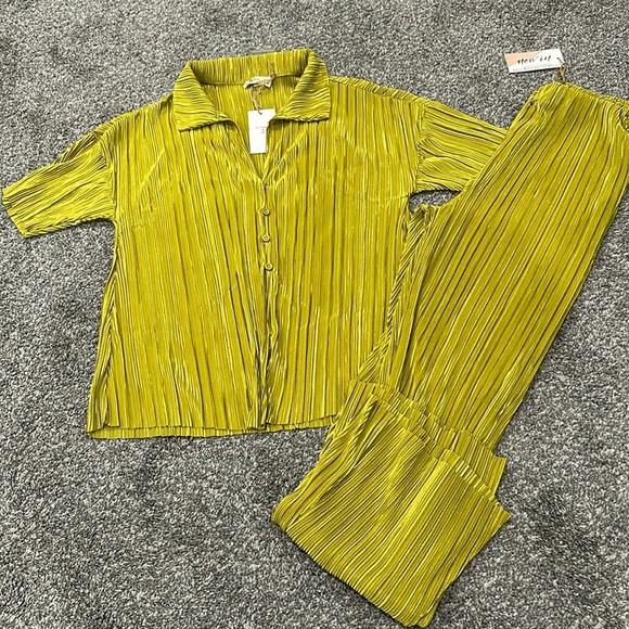 New In Tops - Nwt set. Top and pants. Boutique brand new